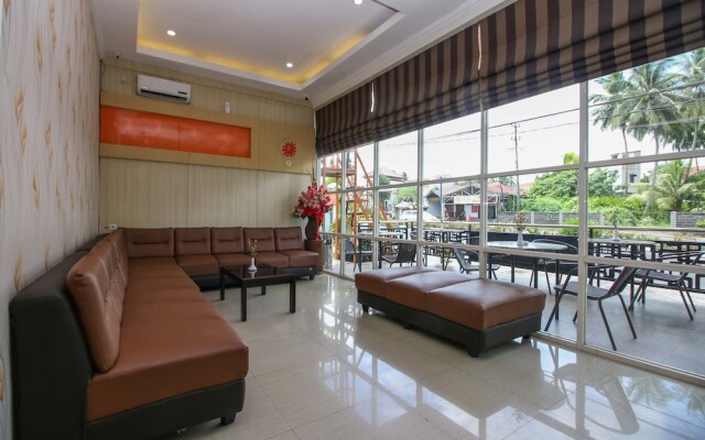 Airy Mapanget AA Maramis Manado