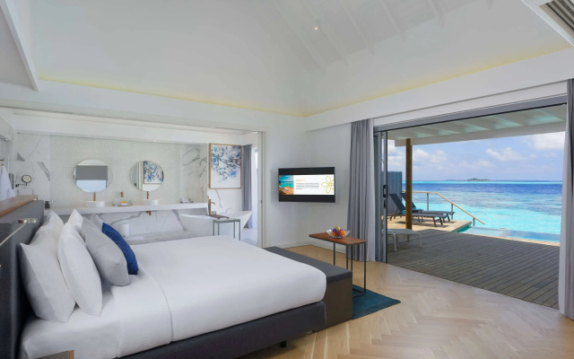 Outrigger Maldives Maafushivaru Resort - photo 2