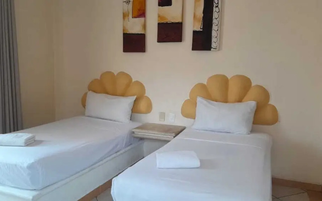 Hotel manzana blanca