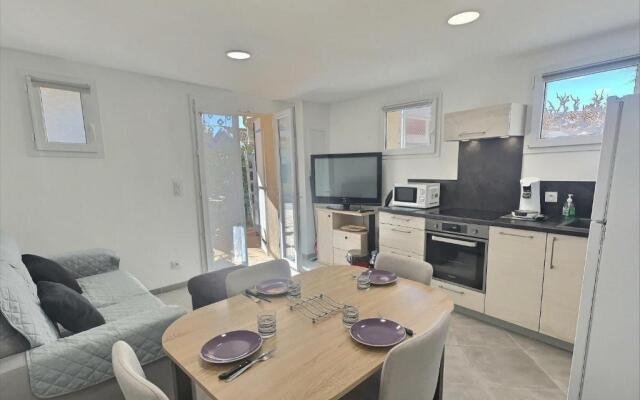 Agréable appartement climatisé à 25m de la plage