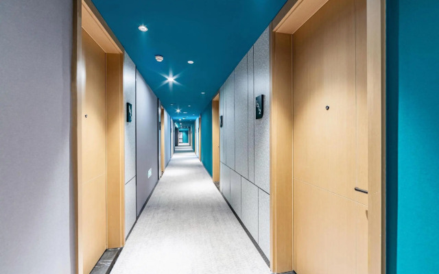 Ginza Jiayue Select Hotel (Qihe Wanda Plaza Spring City Oulebao)