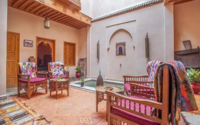 "room in Guest Room - Riad Lakouas Triple Room With Pool View"