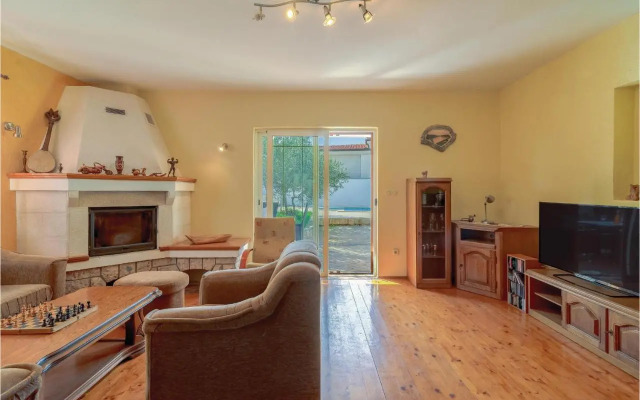 Two-Bedroom Holiday home Jezera with a Fireplace 05