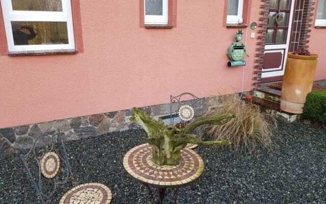 Swallow's Nest in the House by the Pond