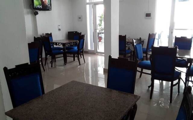 The Garden Hotel y Restaurant