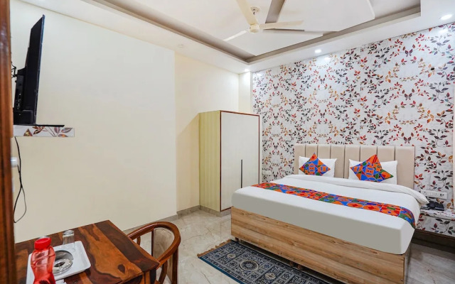 Fabhotel Ada Residency