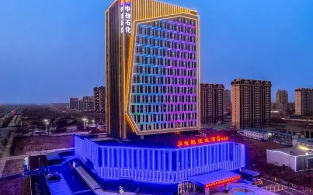 Huayue Kaixuan Grand Hotel (Weiye Building Xincheng Bus Station)