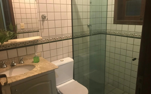 Casa 5 suítes com piscina e churrasqueira