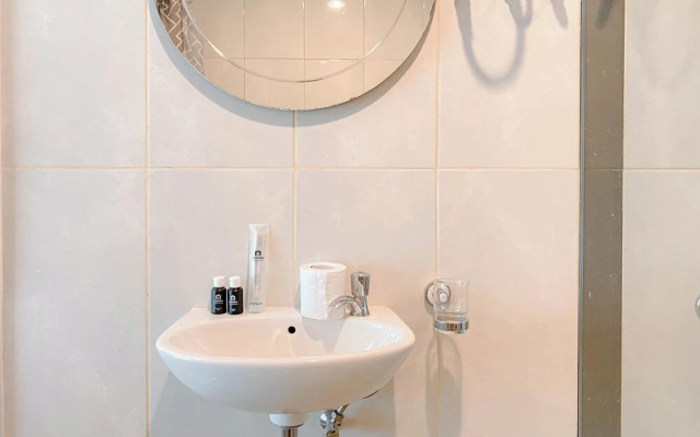 Homey and Restful Studio Grand Kamala Lagoon Apartment