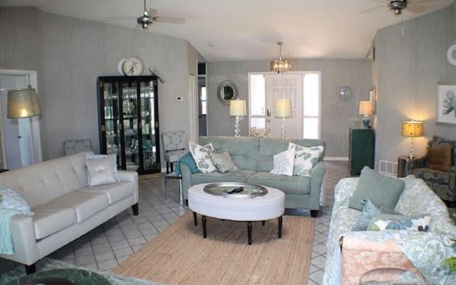 Waterfront vacation home with solar heated pool by Redawning