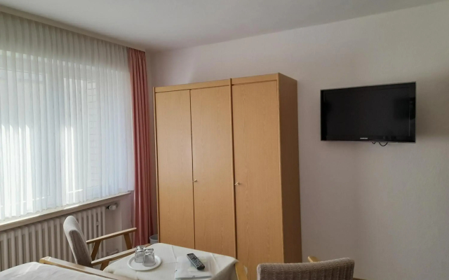 Ferienwohnung und Gästezimmer Iburgblick