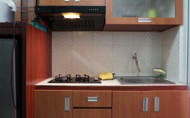 Homey and Warm 2BR Green Pramuka Apartment