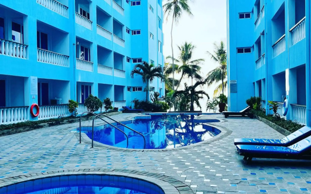 Cowrie Shell Beach Apartments