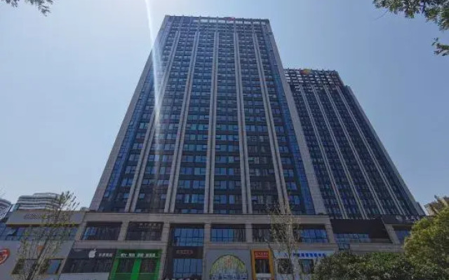 Moshanghuahuashui Intelligent Hotel (Baolong Square Branch)