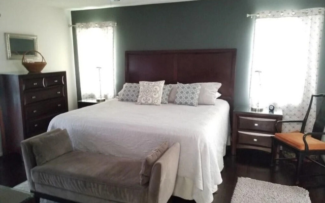 Waterfront vacation home with solar heated pool by Redawning