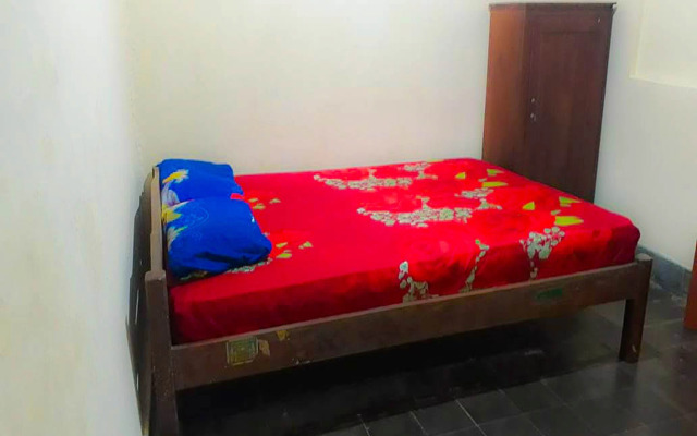 Losmen 2000 Tiga