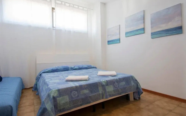ALTIDO Lovely 1BR flat with patio and parking