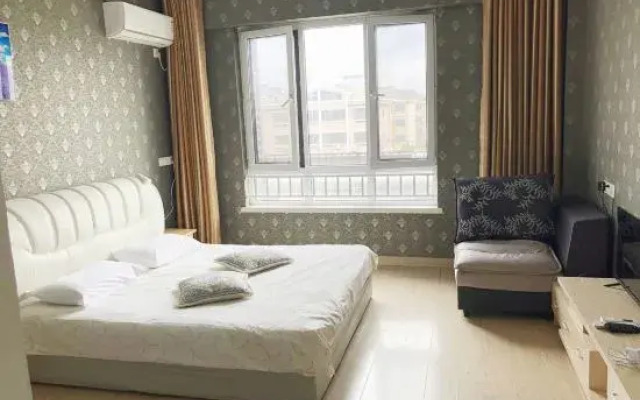 Home Huayi Hotel (Pingdu Renmin Road Branch