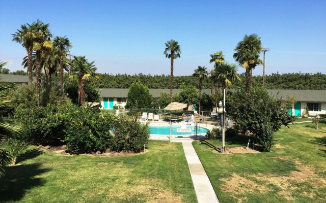 99 Palms Inn & Suites