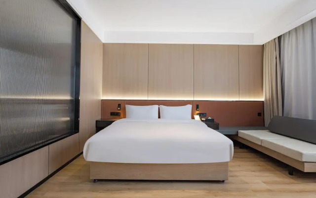 Wanzai Yijia La Maison Hotel