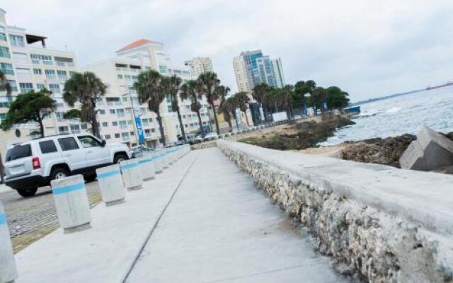 Malecon Rooms y Hotel