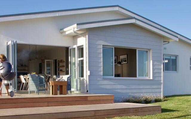 Seafront house with a view