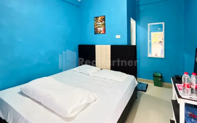 Penginapan Gindo Sidebuk Debuk Berastagi RedPartner – Guest Rooms – Berastagi