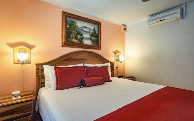 Prado Inn & Suites