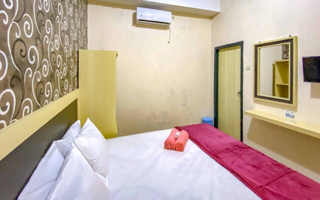 Tini's Guest House Malang RedPartner