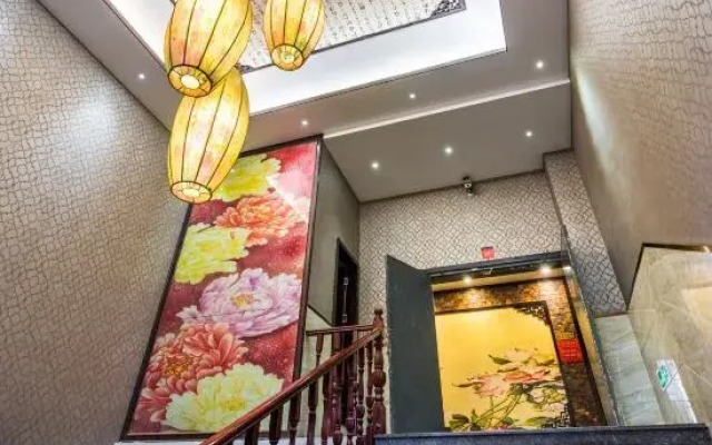 Jinxiu Zhixing Business Hotel