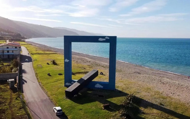 Apartment window on the sea