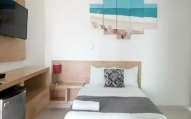 Capital O Hotel Arena Beach Club