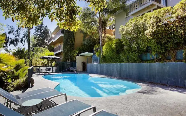 MidCentury Poolview Retreat by LuxPads
