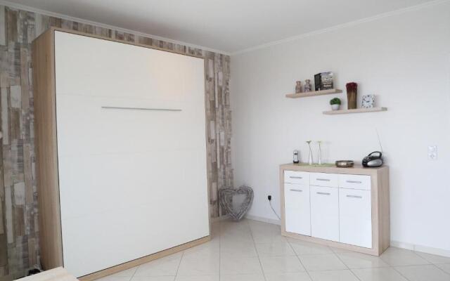 FeWo Tietjen, mit Meerblick, Strandhochhaus F9