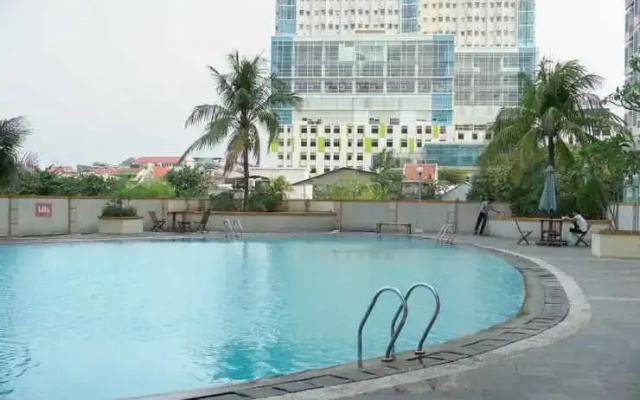 Modern 1BR at Margonda Residence 1 Apartment By Travelio
