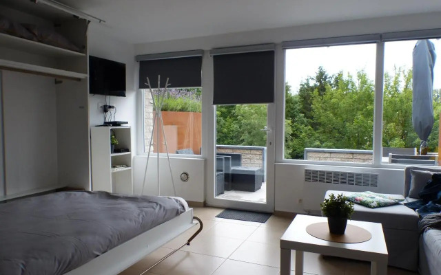 Les terrasses de Malmedy Studio 333 Yellow Grey