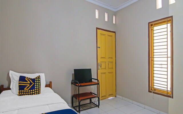 SPOT ON 91958 Flamboyan 25 Homestay Syariah