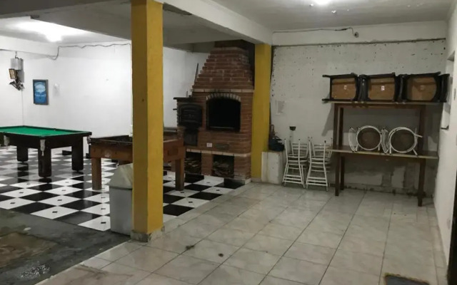Ótima casa com piscina em Praia Grande