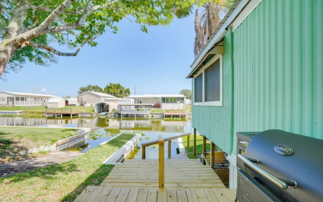 Boat & Fish: Canal-front Home on River