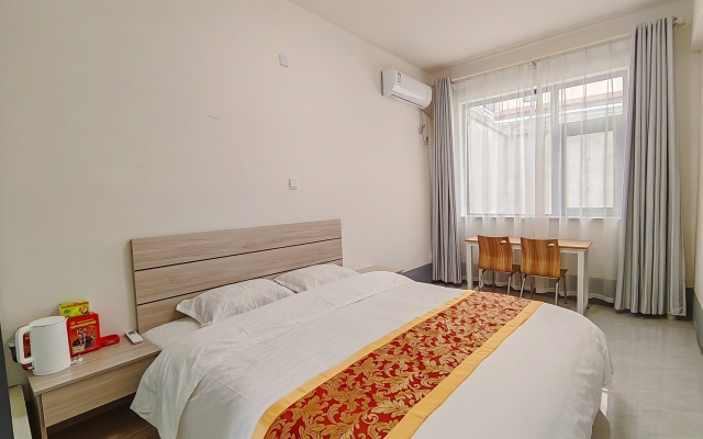 Xinjinlong Holiday Hotel (Linzhou Avenue Bus Station)