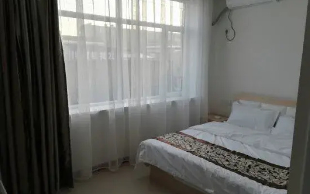 Kangping Hexing Hostel