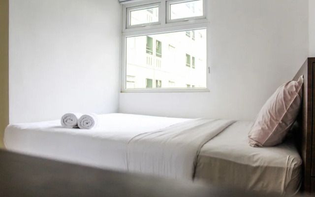 Comfortable and Tranquil 2BR Apartment at Green Pramuka By Travelio