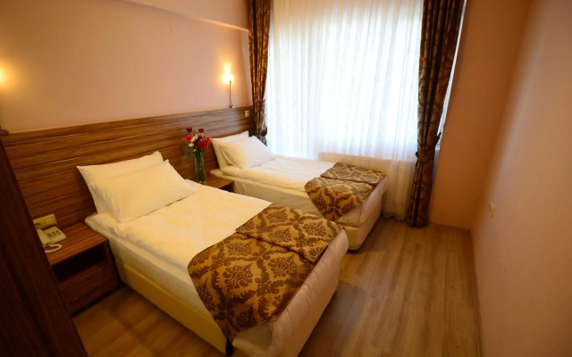 Dort Mevsim Suit Otel