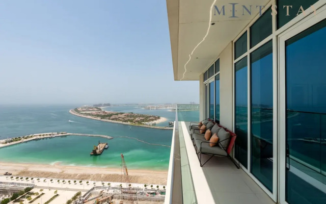 Elegant 2BR Emaar Beachfront Retreat