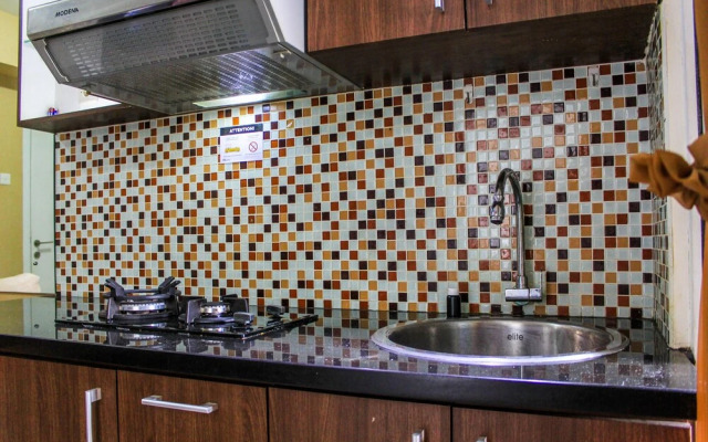 Comfortable and Tranquil 2BR Apartment at Green Pramuka By Travelio