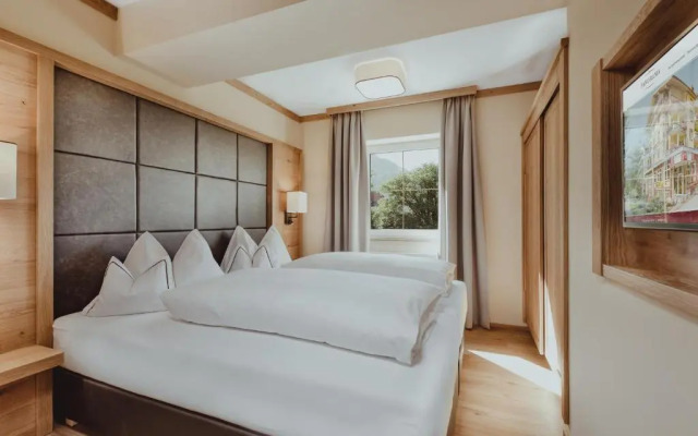 Appartement Hotel Panorama-im Bademantel direkt in die Alpentherme