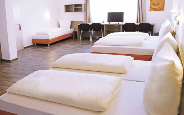 Orange Hotel und Apartments