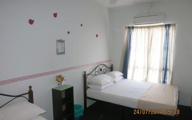 SPOT ON 89952 Sayang Selalu Guest House
