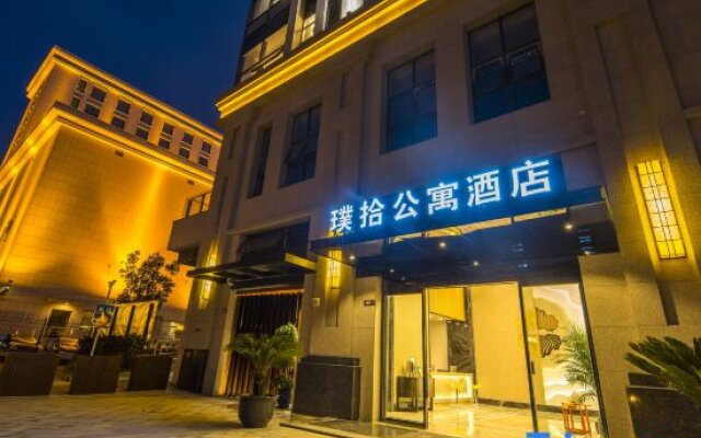 Maoyuan Qiluo Pushi Apartment Hotel