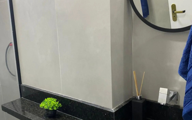Apartamento novo ao lado do Rio Centro!